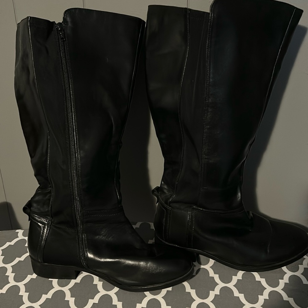 Tall black boots, Size 7 listed on bottom but fit size 10, wide calf, like new